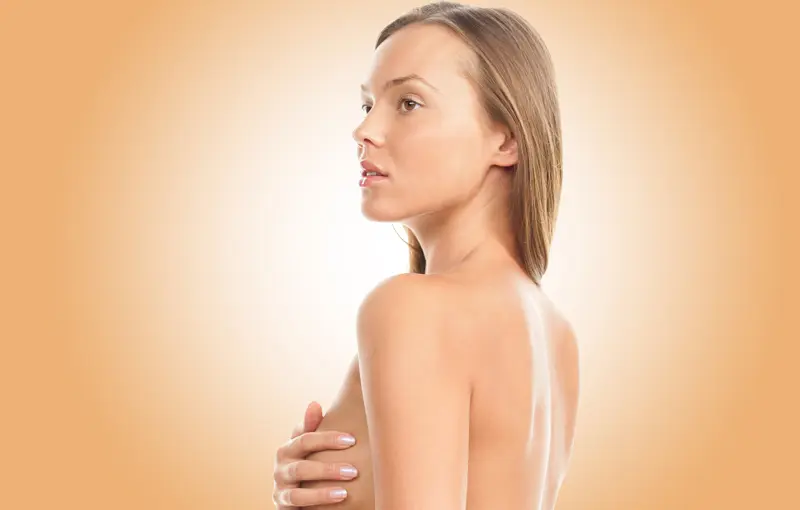 Perfect slim toned young body of brunette sensual girl, fit woman at studio. The fitness, diet, sports, plastic surgery and aesthetic cosmetology concept. Long legs.